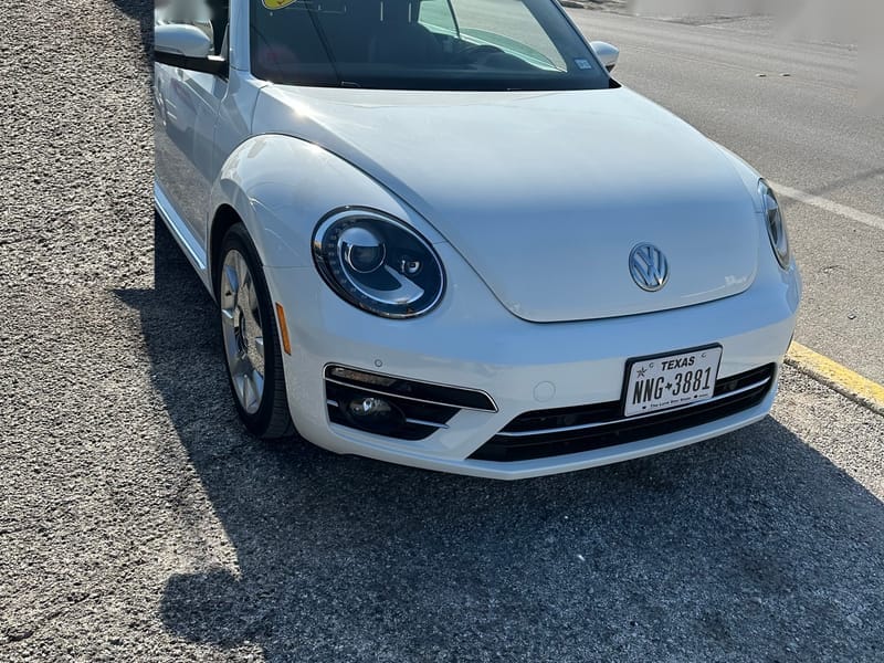 White 2019 Volkswagen Beetle Final Edition convertible photographed at a front three-quarter angle on the lot